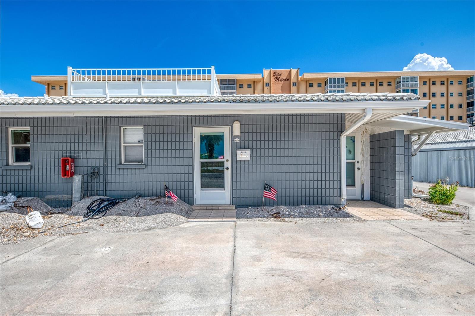 Two bedroom, two bath villa in the small, beachside community of Sea Villas. Your villa is just steps out your door to the community heated pool and the beautiful Gulf of America. Park right next to your unit. You have a private mailbox too. The unit is in need of some remodeling and new flooring. This is a great place and a great buy.