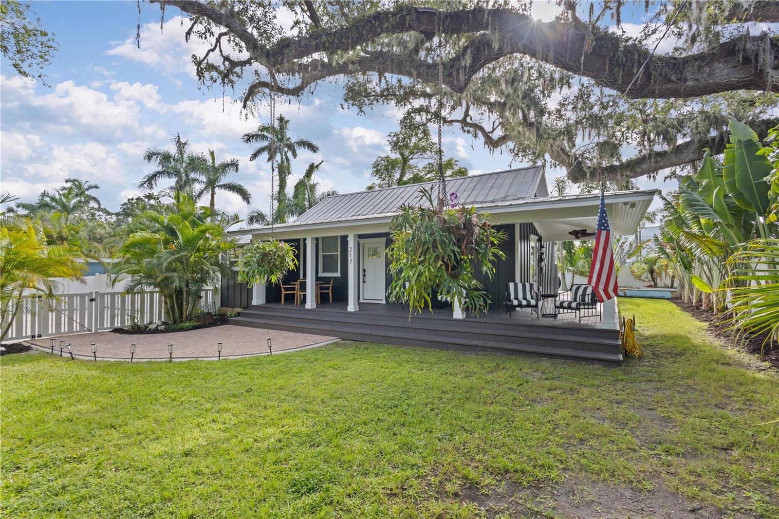 Restored 1920s Gem Steps from the Manatee River
Welcome to your private oasis in historic Bradenton—where timeless charm meets designer luxury. Nestled just a block from the scenic Manatee River and the newly revitalized Riverside Drive, this beautifully renovated1920s residence offers the perfect blend of character and modern elegance.
Completely renovated between 2022 and 2023, the home features all-new roofing, plumbing, electrical, HVAC, windows, and interiors. No detail was overlooked in its transformation. Designed by one of the area's premier interior designers, the home now showcases custom elements and thoughtful finishes throughout.
Step into the heart of the home—the chef’s kitchen—where custom cabinetry with glass-inset doors pairs beautifully with quartz Calacatta countertops and Bosch stainless appliances. The warmth of wood pecky cypress ceilings and tongue-and-groove detailing continues into the main living area, creating a sense of rustic sophistication.
The spacious master suite is your personal spa-like escape, featuring a custom-built steam shower with aromatherapy, dual sinks, and a freestanding soaking tub. Italian oversized porcelain flooring in a wood-plank style flows throughout the home, enhancing both durability and design. Vaulted ceilings in the main living areas elevate the open-concept living spaces, adding to the home's airy and inviting ambiance.
Additional highlights include Control4 smart home security system and Phobos, a custom-built laundry wall and a wrap-around porch ideal for enjoying your morning coffee or evening breeze. The large backyard offers endless potential for outdoor entertaining or peaceful retreat.
Located minutes from shops, dining, and riverfront strolls, this exceptional property offers not just a home—but a lifestyle.