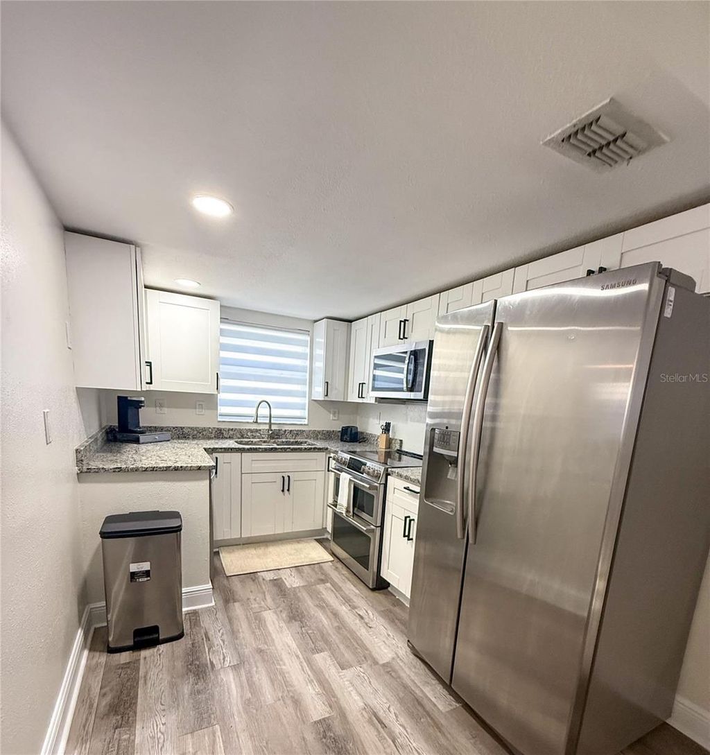 Photo of 7011 Oakwood Drive, New Port Richey, FL 34652 (MLS # TB8430486)