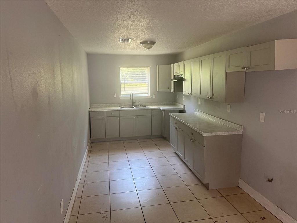 Photo of 4804 Balboa Drive, Orlando, FL 32808 (MLS # O6426941)