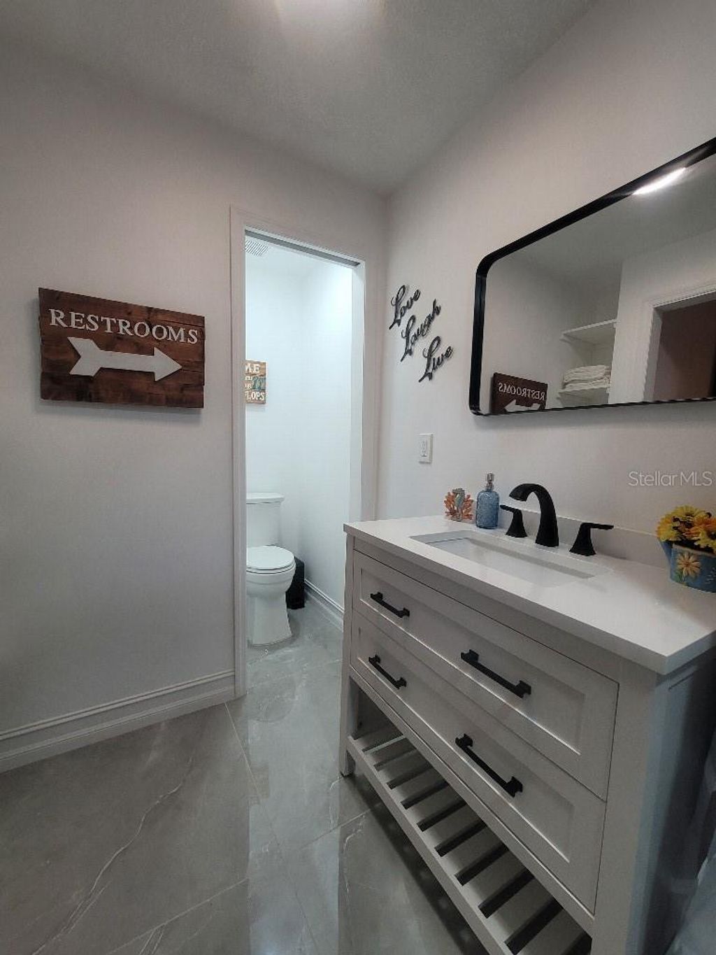 Photo of 3069 19th Place SW, Largo, FL 33774 (MLS # TB8469342)