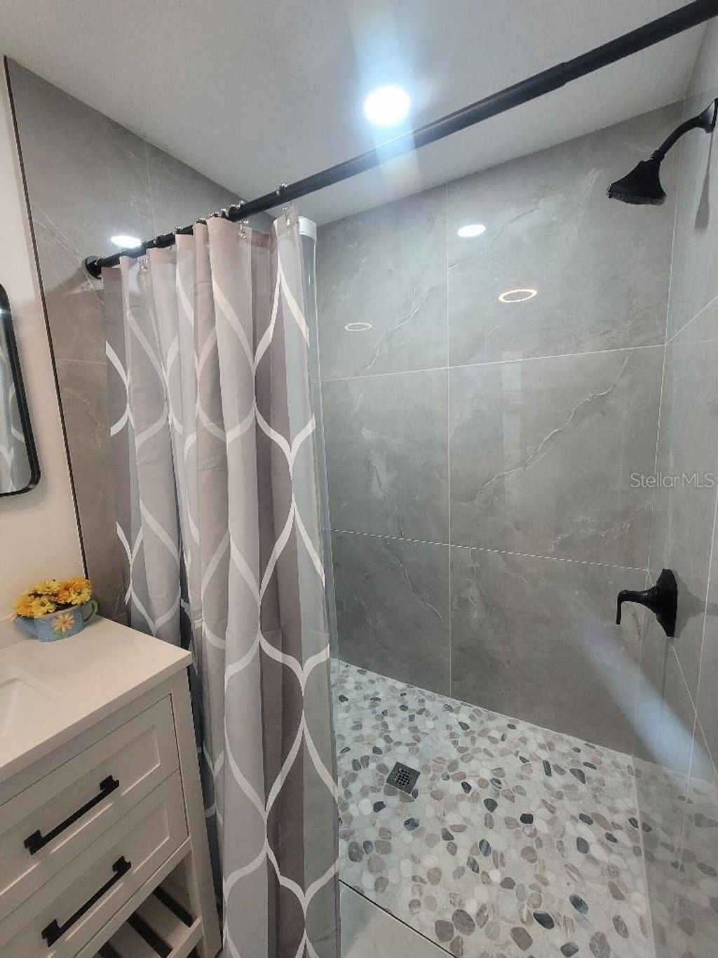 Photo of 3069 19th Place SW, Largo, FL 33774 (MLS # TB8469342)