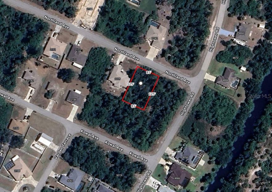 Conveniently located building lot in the growing City of North Port. Seven minutes to I-75. A Publix Shopping Plaza and all it's shops and restaurants is also less than five minutes drive. The Port Charlotte Mall is also less than a five minute drive. Highly rated Sarasota County Public Schools. Not in a flood zone. There are nice houses all around.