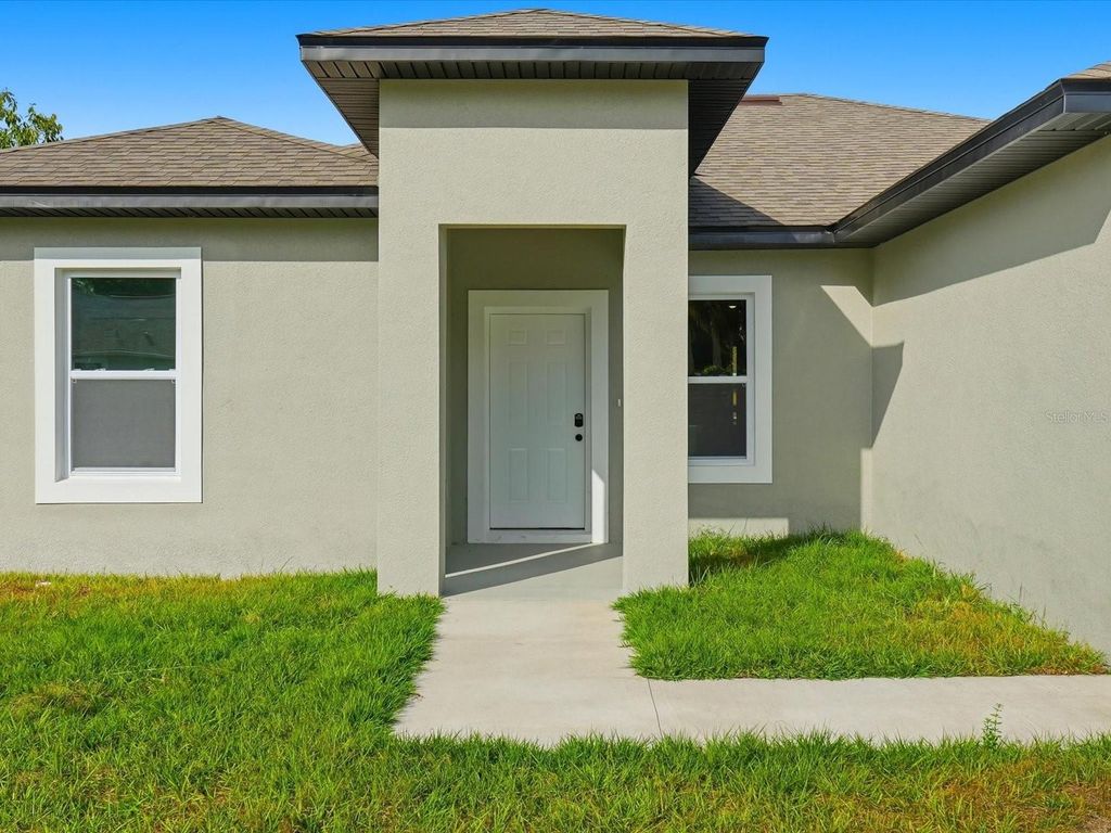 Photo of 21460 Dawson Avenue, Port Charlotte, FL 33952 (MLS # C7518944)