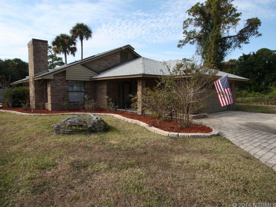 This immaculate 3/2 brick home is situated on a private cul-de-sac street and features a grand great room design with cozy brick fireplace, vaulted ceilings, eat in kitchen, twin sinks in master bathroom and a covered porch accessed from the Master bedroom and bathroom. All new stainless appliances+a newer glass front wine cooler. Brand new 25 year architectural shingle roof. Garage is currently being used as a multiple room utility type configuration. ;Water: City