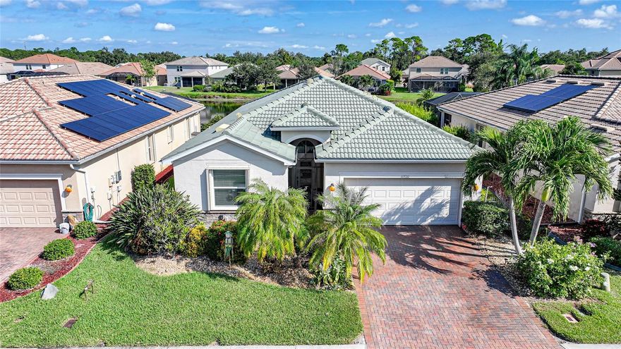 Welcome to this stunning 4-bedroom, 3-bathroom home with a 2-car garage, perfectly positioned on a serene lake in the desirable gated community of Stoneybrook at Venice. Offering over 2,000 square feet under air, this home combines spacious living with elegant finishes and resort-style amenities.
Step inside to find 10-foot ceilings with crown molding that create an open, airy feel throughout the main living areas. The diamond pattern tile flooring in the main spaces provides a clean, modern look, while carpeted bedrooms offer comfort and warmth. The kitchen is a true centerpiece, featuring granite countertops, a stylish tile backsplash, pendant lighting over the island, and a large pantry—perfect for both entertaining and everyday living.
Enjoy beautiful lake views from the living room through the 8-foot sliding glass doors that opens to a screened-in lanai, ideal for relaxing mornings or peaceful evenings outdoors. An added electrical outlet on the lanai for an outdoor kitchen while another outlet at the BBQ Grill area for the rotisserie. An additional outlet at the front of the home is perfect for holiday decorating. Low voltage wiring has been installed for accent lighting in the front yard. A screened in front entry allows you to open your front door without flying insects entering.
The spacious primary suite offers a private retreat with a luxurious ensuite bathroom featuring a garden tub, walk-in shower, and dual vanities.
Additional upgrades include attic stairs and plywood flooring for easy attic storage, and a generator wired directly into the electrical panel—simply flip a switch to power your home during an outage.
Residents of Stoneybrook enjoy a vibrant, active lifestyle with access to a state-of-the-art fitness center, resort-style pool, tennis and pickleball courts, basketball, volleyball, and playgrounds—plus a full calendar of community events and social gatherings.
Located just minutes from Downtown Venice, Downtown Wellen Park, and the Gulf beaches, this home offers the perfect blend of comfort, convenience, and Florida lifestyle.