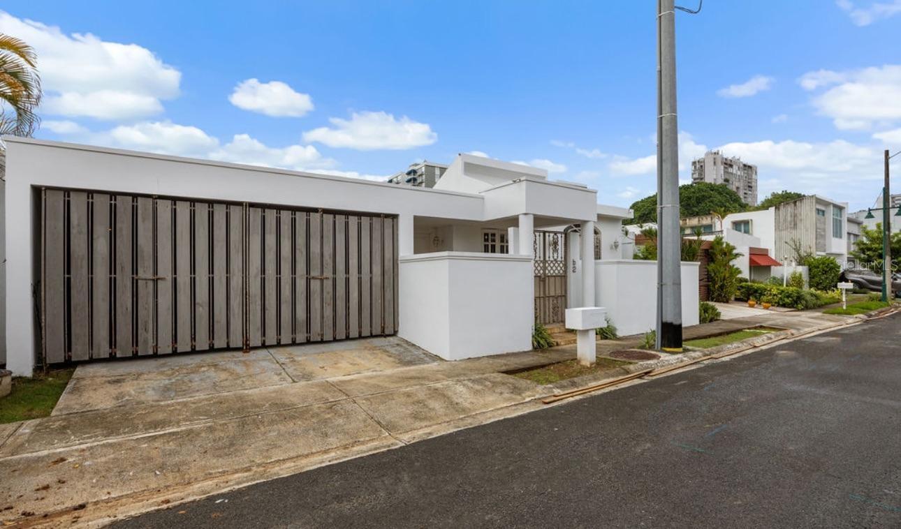 Discover the potential to create your dream home in Mansiones de Garden Hills, one of Guaynabo’s most sought-after gated communities. This bright and generously sized single-story residence spans approximately 2,482 square feet and sits on a 398-square-meter lot. The home offers a functional layout, ready for renovation and your personal vision.
The home features formal living and dining areas, a spacious covered terrace, a family room that opens to an interior courtyard, a kitchen, and an open pool terrace. It consists of four bedrooms and four full bathrooms, ideal for enjoying natural light, cross-breezes, and relaxed indoor-outdoor living.
Additional highlights include a two-car garage with storage space, an equipped kitchen, and inviting patio areas perfect for entertaining or unwinding.
Residents of Mansiones de Garden Hills enjoy access to exclusive amenities currently being upgraded, including tennis, pickleball, and basketball courts, a playground, and a scenic walking trail.
Conveniently located just 15 minutes from San Juan, the neighborhood offers easy access to top-rated schools, fine dining, and premier shopping destinations such as Garden Hills Plaza, WAPA, and San Patricio Plaza.
With 24/7 security, this gated community provides the privacy and peace of mind you deserve. Bring your creativity and make this exceptional property your own, schedule your visit today!