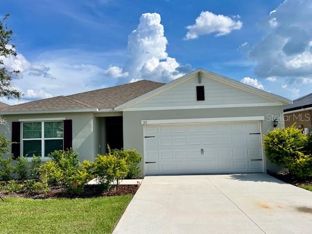 One or more photo(s) has been virtually staged. Price reduced! Seller motivated. Please submit your best and highest offers to LA in PDF, including proof of funds or Pre-approval letter. Beautiful, cozy, and ready to move-in, this home beckons you. Located in a well-established community, this lovely home offers an open floor plan with 4 bedrooms, 2 full baths, 2-car garage, and a lanai overlooking the lake at the back. This concrete block home has an open concept kitchen overlooking the living area, dining room, and outdoor lanai. Entertaining is a breeze, as this sweet home features a spacious kitchen island, dining area, and a large pantry with plenty of room for storage. Stainless steel appliances, smart home technology, and much more. The master suite is located off the living space in the back of the home for privacy. The master bathroom has a double vanity, spacious shower space as well as a large walk-in closet. Towards the front of the home, two additional bedrooms share a second full bathroom. Across the hall, you will find a fourth bedroom. This home offers space to fit all your needs. This master planned community of Eden Hills offers exclusive amenities, cabana, swimming pool, Tot Lot, dog park, playground, and sidewalk Conveniently located between Tampa and Orlando, only 8 minutes away from I-4, it allows for an easy commute to either one. Enjoy the best and convenience of both cities as well as the peaceful surroundings. Schedule your showing today!