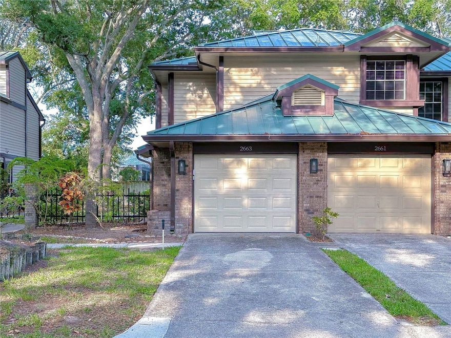 This is the one that you've been waiting for! Beautiful and selling fully furnished! Just pack your clothes and move right in!!You couldn't pick a more perfect spot to live the Florida lifestyle than this gorgeous condo. It is located right in between downtown Dunedin and the quaint social scene of Palm Harbor. The Pinellas Trail and Honeymoon Island are within a mile too. This spacious two-bedroom, two-bathroom unit is beautiful. It has a white kitchen with granite counter tops, stainless steel appliances and a large pantry. There is even a separate desk space should you need it. There is a really nice flex/bonus/family room/exercise/office/den space off the kitchen area. Current owners are using it as a family and dining room space. Whatever your personal needs are this extra space is invaluable. The main Living room is beautiful. It has vaulted ceilings and beams. There is also a fireplace and skylight here with access to the screened in lanai. This space again could be a more formal living/dining room if that is what you need. The master bedroom also has the same vaulted ceilings with beautiful wood beams. It is large and offers an entrance to the screened in Lanai as well. The master bathroom has a marble topped double vanity and a walk-in shower. It also has a private tub space. The walk-in closet is huge and has built in closet/shelving system. The guest bedroom once again is a great size. There is plenty of room for a queen size bed and it has a nice size closet. The second bath has a tub/shower and large vanity. The whole complex has received new metal roofing and skylights. No obligation to new owner though because the current owner has paid the roofing assessment off in full. Unit has new AC, HW heater and Garage door too. There is a pool and hot tub on the grounds as well as tennis courts. This unit is perfect for the snowbird or the full time Florida resident. Call to schedule your showing today.