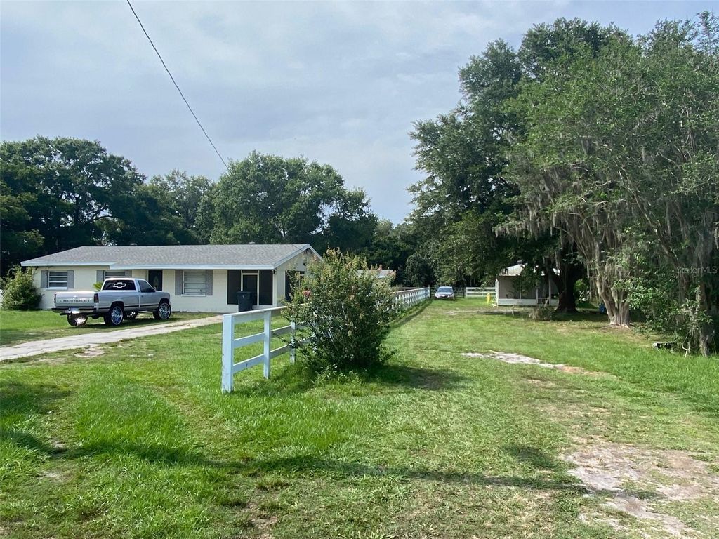 Photo of 4316 E Knights Griffin Road, Plant City, FL 33565 (MLS # TB8389453)