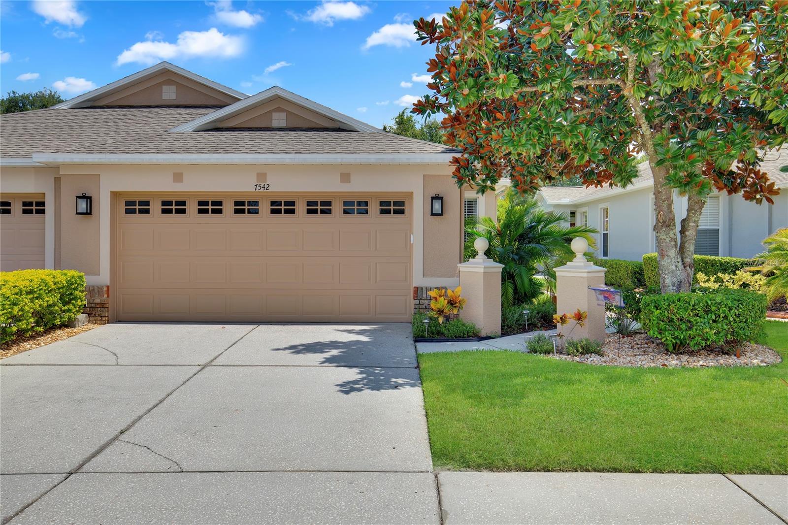Welcome to your beautifully updated 2-bedroom, 2-bath home with an office in one of the area's most desirable gated villa communities! Situated on a peaceful conservation homesite, this 1,522 SF residence offers both privacy & serene views with no rear neighbors. Step inside to discover an inviting, open floor plan featuring warm, neutral tones & low-maintenance laminate flooring - no carpet anywhere! The modern kitchen comes complete with all appliances & flows seamlessly into the main living space, perfect for everyday comfort or entertaining. Enjoy your morning coffee or evening glass of wine on the fully equipped lanai, which includes everything you need to relax in style year-round. This move-in-ready home also includes a 2-car garage, updated finishes, & plenty of storage. Located in a gorgeous, amenity-rich community, you'll have access to a robust lifestyle package with clubhouse, pool, fitness center, & more-all designed for active adults. Don't miss your chance to live in comfort & style with everything you need already in place. Schedule your showing today!