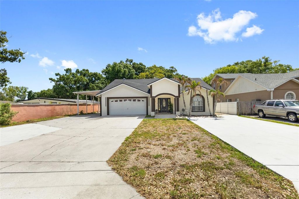 Photo of 8019 N Gomez Avenue, Tampa, FL 33614 (MLS # TB8500576)