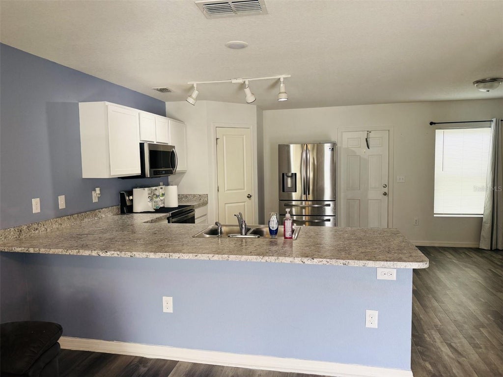 Photo of 12020 Pine Warbler Avenue, Weeki Wachee, FL 34614 (MLS # W7889927)