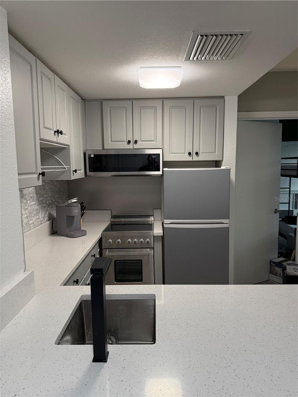 Photo of 6165 Carrier Drive #3106, Orlando, FL 32819 (MLS # O6403118)