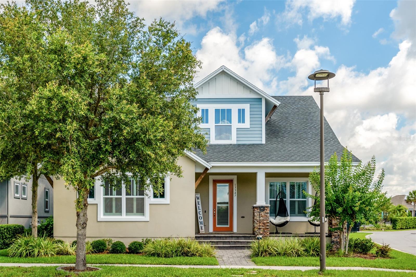 Located in a perfect location at Lake Nona’s premier community of Laureate Park. This stunning DAVID WEEKLEY home sits on an oversized, corner lot with partial WATER VIEWS from the front porch. With 4 bedrooms, 3 full bathrooms, an office, and a versatile loft, this thoughtfully designed space is tailor-made for both relaxing and entertaining. At the entrance, a foyer and bonus room/office greet you. The heart of this open concept floor plan is the gourmet kitchen, featuring sleek quartz counters, modern hardware and backsplash, stainless steel appliances, built-in ovens, ample cabinetry, pantry, upgraded flooring throughout and an oversized island with views of the rear patio and fenced backyard. Plenty of Natural Light fills the open-concept floor plan which seamlessly connects the kitchen, dining area, and living room, making it perfect for year-round entertaining. The primary suite features custom accent walls, trayed ceiling, a spa-like bathroom with a large frameless shower and extended walk-in closet. On the second floor, two additional bedrooms are generously sized, perfect for family or guests, while the versatile loft offers the ideal space for a playroom or second living area. Step outside to experience your beautiful OUTDOOR OASIS complete with covered lanai, corner homesite with room for a pool, and an extended fenced-in private backyard that is the ideal space to enjoy time with family and friends. Must see in person to fully appreciate every detail of this immaculate home. Additional notable features: custom accent walls in family room and office, also CUSTOM BUILT-IN CLOSETS throughout the home. Situated in Laureate Park, this family-friendly community offers a harmonious blend of natural beauty and modern amenities. Enjoy the aquatic center with its 3 pools, or engage in outdoor fun at the tennis and basketball courts, pocket parks, and scenic walking trails. For those who love technology, Laureate Park includes Gigabit Fiber Internet to every home. Located near the vibrant Lake Nona Town Center and top-tier Medical City, this neighborhood is close to countless shopping and dining options including the extraordinary Lake Nona West shopping complex coming in early 2026. This extraordinary residence is a rare opportunity; arrange your exclusive showing today!