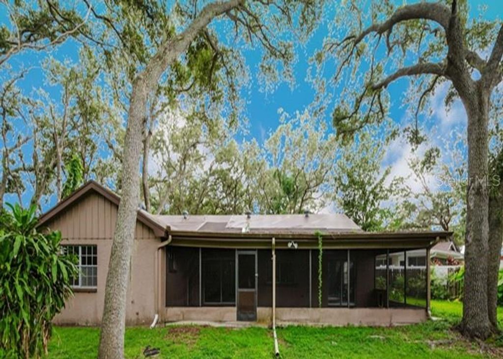 Photo of 1243 Royal Oak Drive, Dunedin, FL 34698 (MLS # TB8432315)