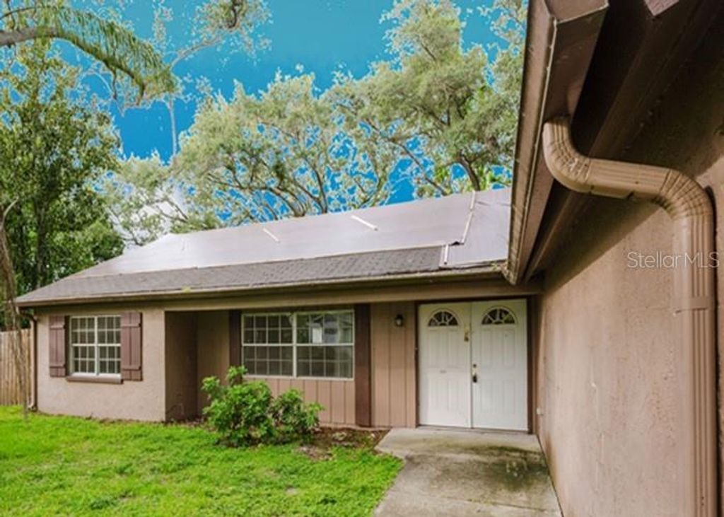 Photo of 1243 Royal Oak Drive, Dunedin, FL 34698 (MLS # TB8432315)