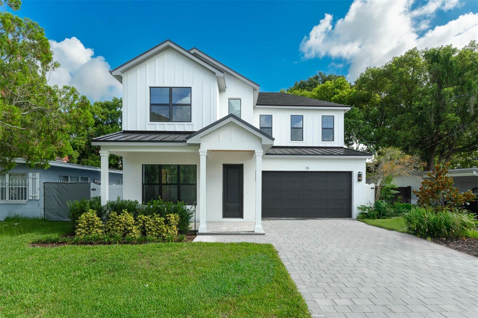Embrace the allure of new construction – Nestled in the vibrant College Park neighborhood, this modern masterpiece awaits, promising a lifestyle of unparalleled comfort and convenience. Prime Location - Situated just moments away from the bustling energy of the "Drive," and in close proximity to the famous Dubsdread golf course and Tap Room. This exceptional home offers the ultimate urban living. Explore local cafes, boutique shops, and entertainment venues with ease, all within walking or biking distance from your doorstep.
Step inside to discover a world of contemporary elegance, where every detail has been meticulously crafted to perfection. The open floor plan seamlessly blends style and functionality. You enter the foyer into the open great room, where the sliding doors allow you to bring the outdoors in, enjoying afternoons by the pool and grilling at your summer kitchen.The gourmet kitchen is equipped with top-of-the-line Bosch appliances, including a 36" gas cooktop, built-in microwave, wall oven, French door refrigerator, and a wine fridge. With its sleek design and premium finishes, this kitchen is sure to inspire your inner chef. The Primary suite offers serene pool views on the main level and a spa-like bathroom with a large soaking tub and wet room.
Boasting four additional spacious suites, this home offers unparalleled comfort for you and your guests. Upstairs, two additional suites await, along with a versatile bonus room that can be transformed to suit your lifestyle – whether as a home office, gym, 2nd living room or fifth bedroom. Contact us today to learn more about this exquisite home and schedule a private viewing. Your College Park sanctuary awaits – make it yours today.