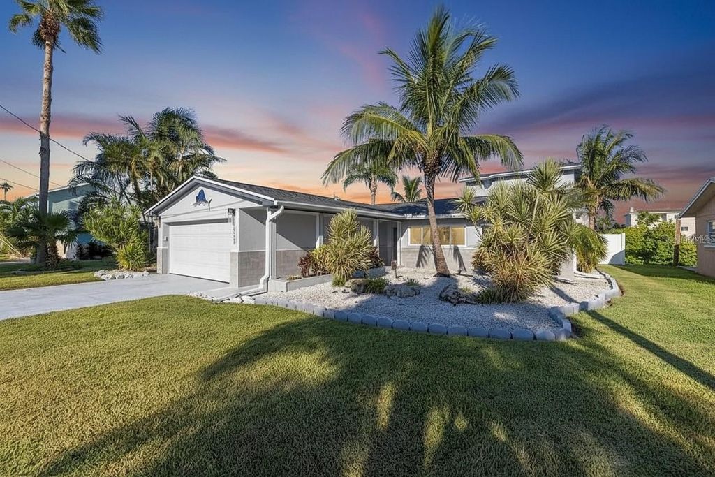 Photo of 533 Lillian Drive, Madeira Beach, FL 33708 (MLS # TB8374953)