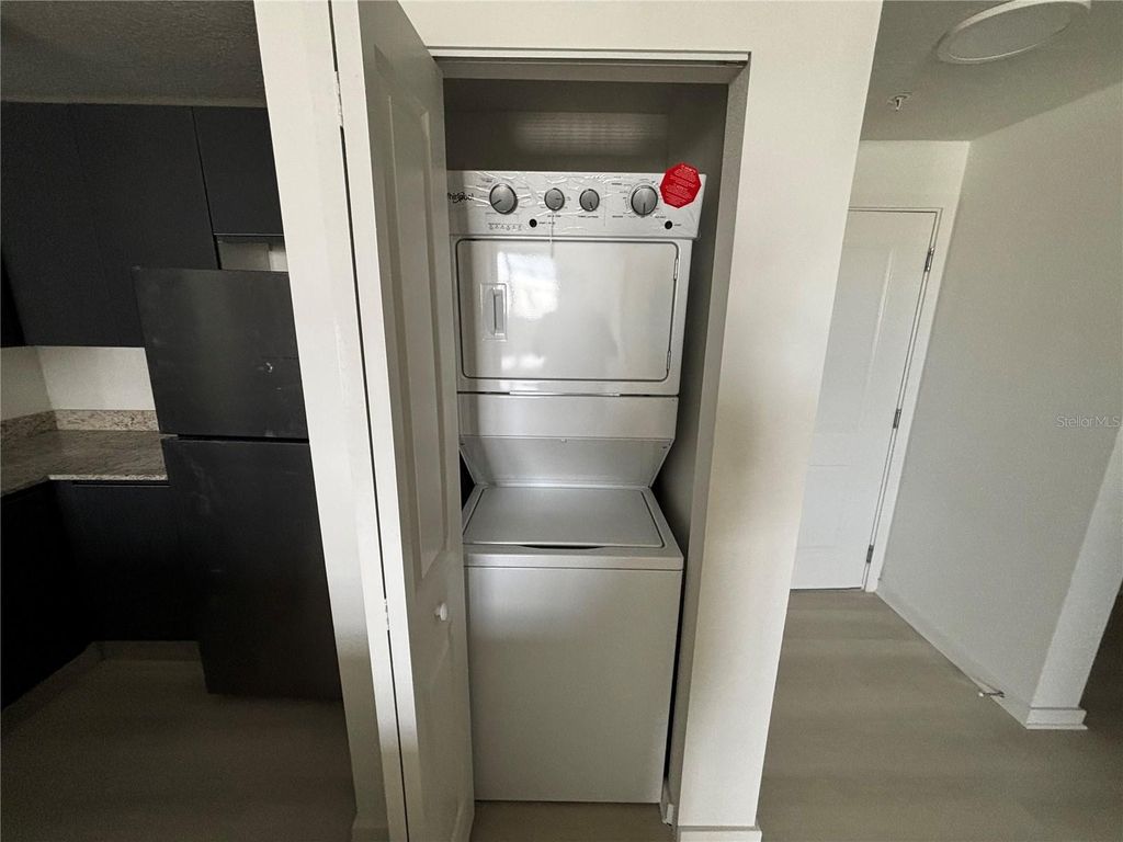 Photo of 5563 Millenia Park Boulevard #411, Orlando, FL 32839 (MLS # O6427471)