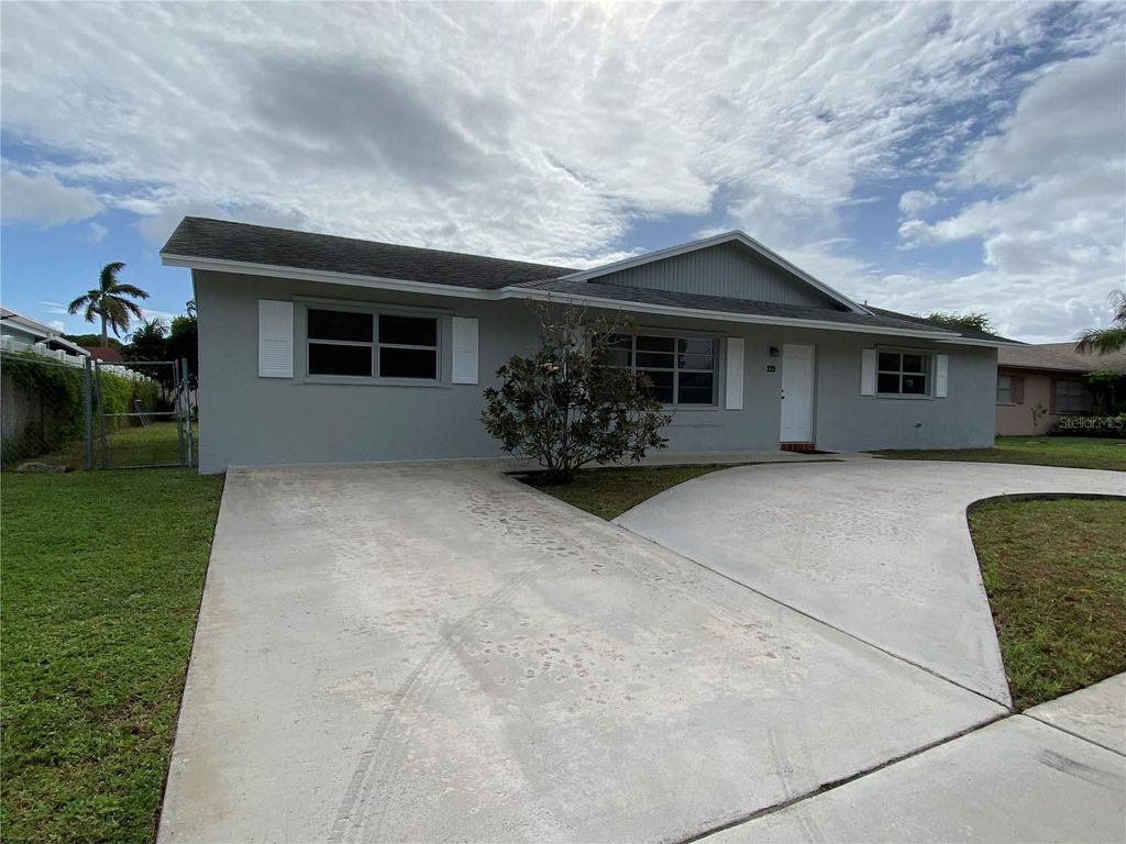 Photo of 225 Wrena Drive, West Palm Beach, FL 33409 (MLS # O6350325)