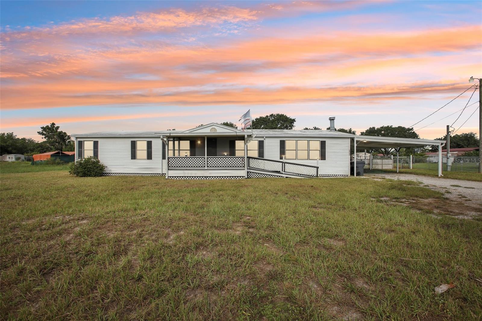 Move-In Ready 3BR/2BA Double Wide Manufactured Home! Offering a Remodeled Kitchen Featuring New Glass Top Range, New Dishwasher, Newer Cabinets, New Back Splash & Newer LVP Flooring. Additional Updates Include: New Carpet, New Bathroom Floors, New Mini-Splits, 2nd Bath Enclosure, New Blinds & Curtains, New Light Fixtures, New Master Bathroom Sinks, New Door knobs, New 2nd Bath Vanity, Fresh Paint, Replaced Electrical Outlets and more! Large .72 Acre Lot, Screened Lanai and Front Porch! No HOA and Just Minutes from I-4. Great Starter Home or Great Rental Property!
