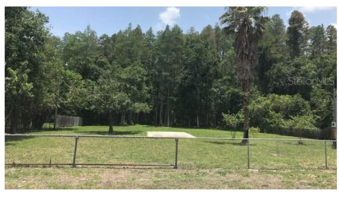 This exceptional conservation lot is ready for your manufactured or mobile home, located in Odessa Gardens, Odessa Fl, lit's about 200 feet from SR-54, in a prime developing area, close to shopping centers, supermarkets, etc. Previously had mobile home on it, now has a storage and a container.