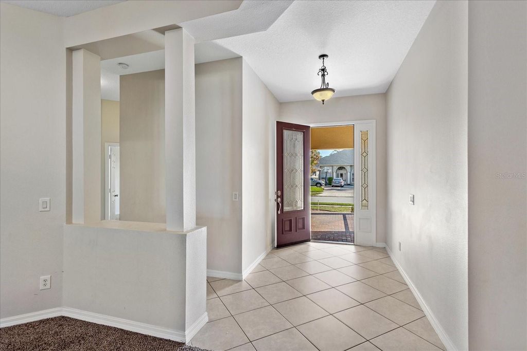 Photo of 7252 Windham Harbour Avenue, Orlando, FL 32829 (MLS # O6364963)