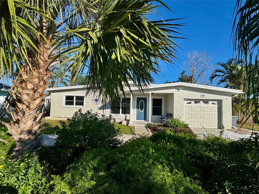 Photo of 941 Palm Drive, Belleair Beach, FL 33786 (MLS # TB8442021)