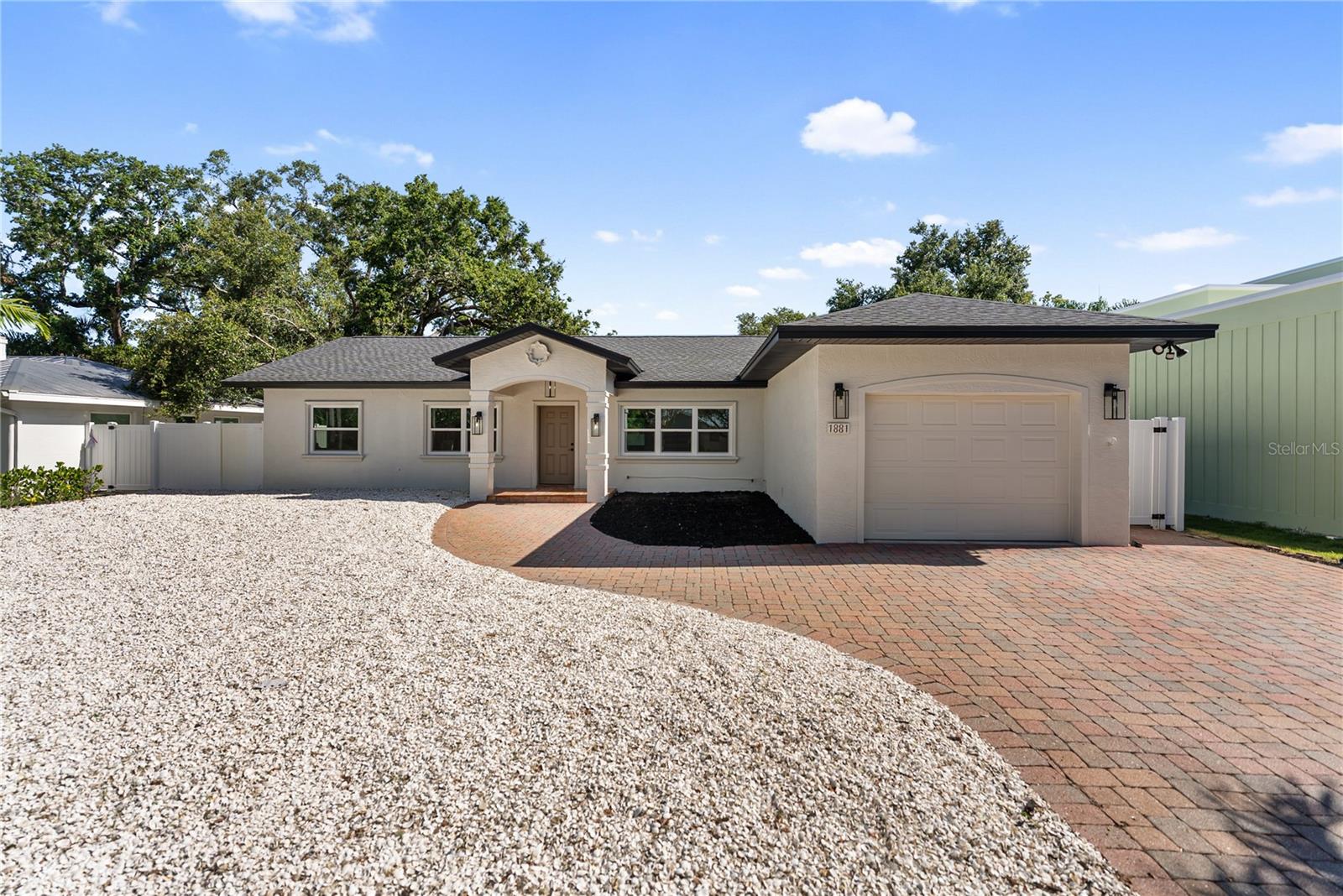 Step inside the soul of Sarasota’s mid-century renaissance, welcome to 1881 Orchid Street, where charm, craftsmanship, and modern upgrades converge in one of the city’s most evolving, investment-savvy neighborhoods: Poinsettia Park.
This 3-bedroom, 2-bathroom home with a bonus room spans 1,710 square feet and sits on a quiet, tree-lined street where new custom homes are redefining the skyline — yet here, you get the best of both eras.
Inside, you’ll find authentic Spanish tile floors underfoot, a fully updated kitchen featuring fresh countertops, crisp white cabinetry, bold patterned backsplash, and sleek appliances — all bathed in natural light from new hurricane-impact windows.
The layout flows effortlessly from living to lounging, with a Florida room perfect for slow mornings, a screened lanai ideal for entertaining, and a fully fenced backyard that offers privacy and play space. The bonus room (with high wood-accented ceilings) is a true chameleon: art studio, office, gym, guest suite — your call.
And here’s where it gets serious:
• New Roof
• New HVAC System
• New Tankless Hot Water Heater
• 1-Car Garage
• Fresh Landscaping & Low-Maintenance shell front yard with paver driveway
You’re less than five minutes to Sarasota Memorial Hospital, Southside Village, and Morton’s Market — with Siesta Key’s white sands just down the road.
This is more than a turnkey home. It’s a strategic opportunity:
Live here while you design your dream home
Buy into the Southside school district now, before prices leap again
Or build new on this valuable lot in a neighborhood already being transformed by luxury developers
Aesthetic, updated, and well-positioned, 1881 Orchid isn’t just a home. It’s a smart move in a shifting market.