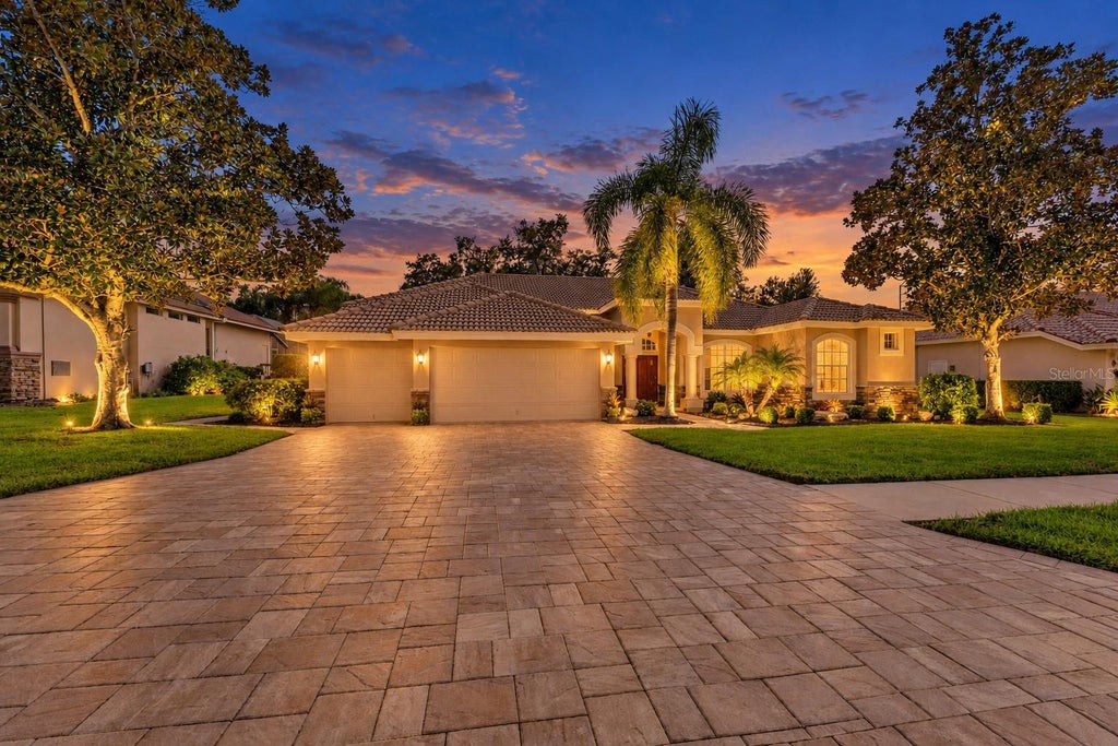 Photo of 1663 Canopy Oaks Boulevard, Palm Harbor, FL 34683 (MLS # TB8560499)