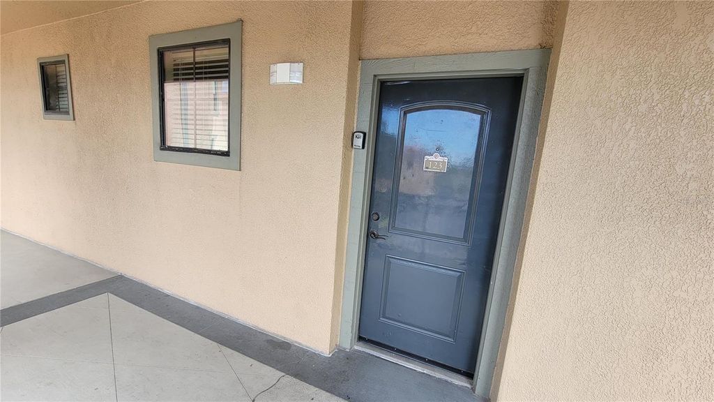 Photo of 914 Charo Parkway #123, Davenport, FL 33897 (MLS # S5146194)