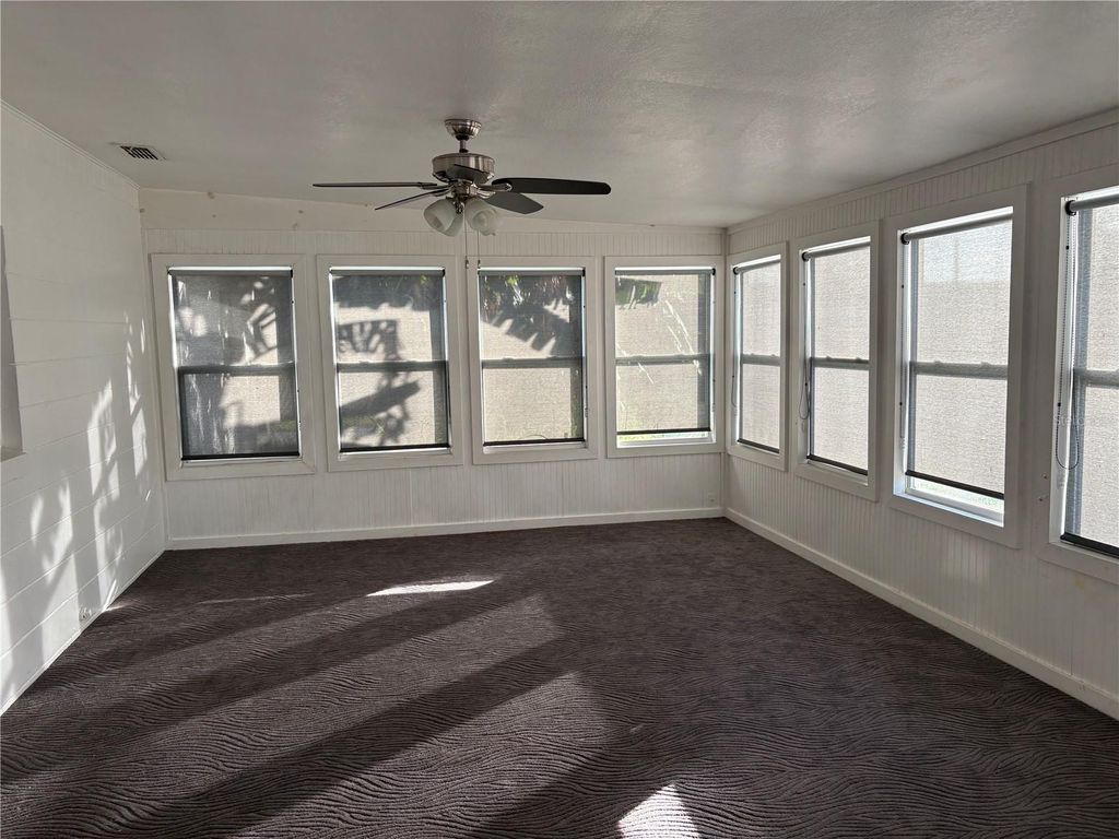 Photo of 626 Third Avenue, Lady Lake, FL 32159 (MLS # OM715581)