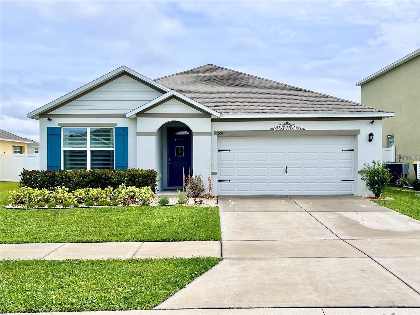 Discover modern Florida living in this stunning 2019-built home, meticulously cared for by its original owner. This property features a bright, open-concept floor plan perfect for entertaining. The kitchen overlooks a spacious great room that flows seamlessly to a large, screened lanai. Enjoy a desirable split-bedroom layout, with a private master suite tucked away at the rear of the home, while two additional bedrooms and a full bath are situated upfront. Community amenities include a sparkling pool. With a 2-car garage, dedicated laundry room, and a prime location convenient to I-4 for easy access to Tampa and Orlando, this home is truly move-in ready.