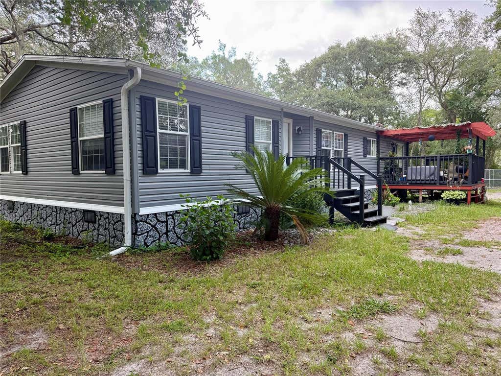 Photo of 7495 SW 155th Street, Dunnellon, FL 34432 (MLS # OM729398)