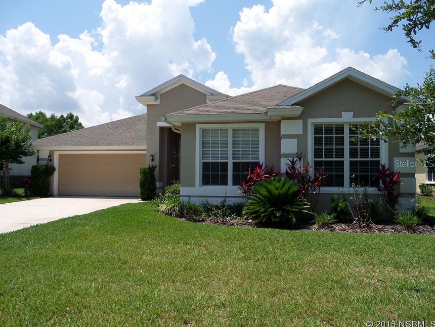 Bright, clean and move in ready, this spacious home sits on a premium golf course and water view lot. The seller has installed new GE Stainless appliances, designer hardware and a custom tile back splash in the kitchen to accent the oak cabinetry. An open floor plan with a large living room, formal dining room area, open kitchen with a peninsula and dining nook that overlooks the large yard. Enjoy a split floor plan for just enough separation from your guests. The master has a slider to the screened and tiled lanai, his and hers walk in closets, an upgraded bathroom with a soaking tub, walk in shower and double gentleman's height vanities. The guest wing features an office/den that could easily be converted to a fourth bedroom, if needed, and 2 large guest bedrooms and a full bathroom. The utility room is off the 2 car garage and near the master bedroom for added convenience. Lawn care and sprinkler maintenance is included with your quarterly HOA fee, so the entire neighborhood looks well maintained. This home is extra special with an upgraded tropical landscape. Rain gutters installed in the front and rear of home. ;Water: City