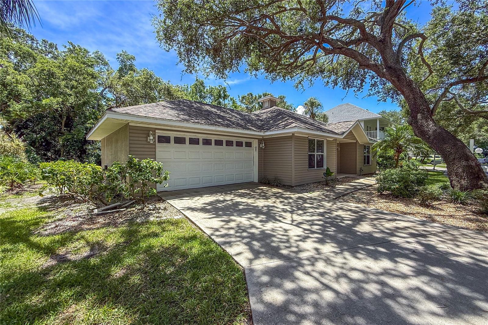 Updated three bedroom home in a nestled in the highly desirable and maintenance-free community of Cape Town Village. Lined with mature trees and exuding tranquility, this community welcomes you home with peaceful charm and a neighborly atmosphere. Step inside to an inviting open-concept living area designed for both relaxing and entertaining. This home is perfectly located in central Bradenton, just minutes away from Blake Hospital, shopping, dining, downtown Bradenton, GT Bray Park, and only 5 miles from the pristine beaches of Anna Maria Island. **Monthly rent includes cable tv, internet and landscaping. Small dogs are allowed. Min 1 year lease is required **