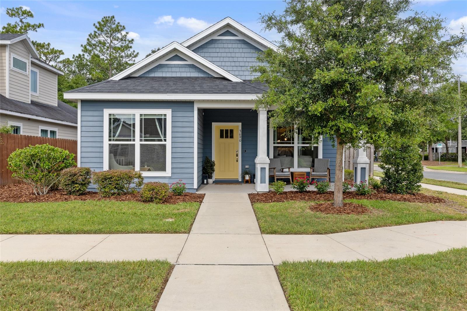 Beautiful, like new 2020 built home in NW Gainesville's Fletcher Oaks! This stunning 3 bedroom, 2 bathroom home features gorgeous wood flooring and crown molding throughout the open floor plan perfect for entertaining. Large dining area just off the family room that also opens to the upgraded kitchen featuring beautiful countertops, stunning white cabinetry and top of the line stainless steel appliances. Large guest bedrooms with plenty of storage. The primary suite boasts tons of natural light, a spa-like luxury bath with dual sinks and a walk-in shower. Expansive closet with tons of shelving. Inside laundry room with sink. Outside you will find a fenced in yard and back porch for your morning coffee. All this in a perfect location minutes to UF, Shands, NFRMC, I75, shopping, and more! Call today!