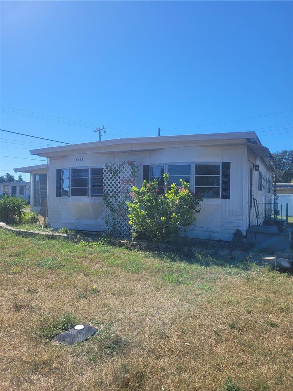 Photo of 1745 Shady Cove Drive, Holiday, FL 34691 (MLS # W7879823)