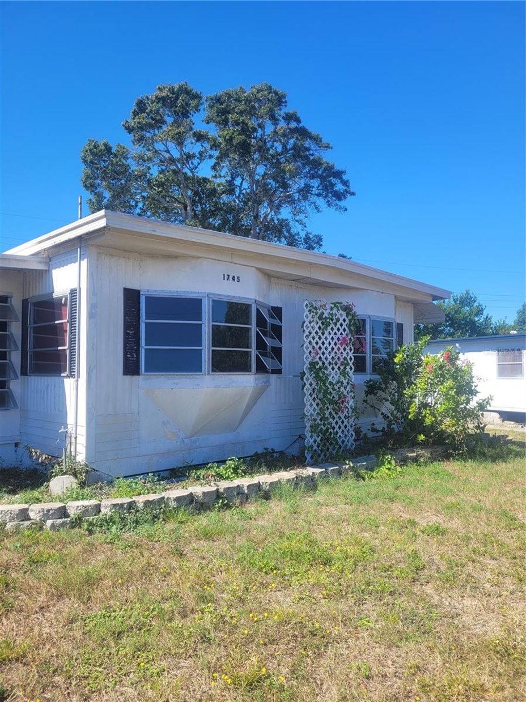 Photo of 1745 Shady Cove Drive, Holiday, FL 34691 (MLS # W7879823)