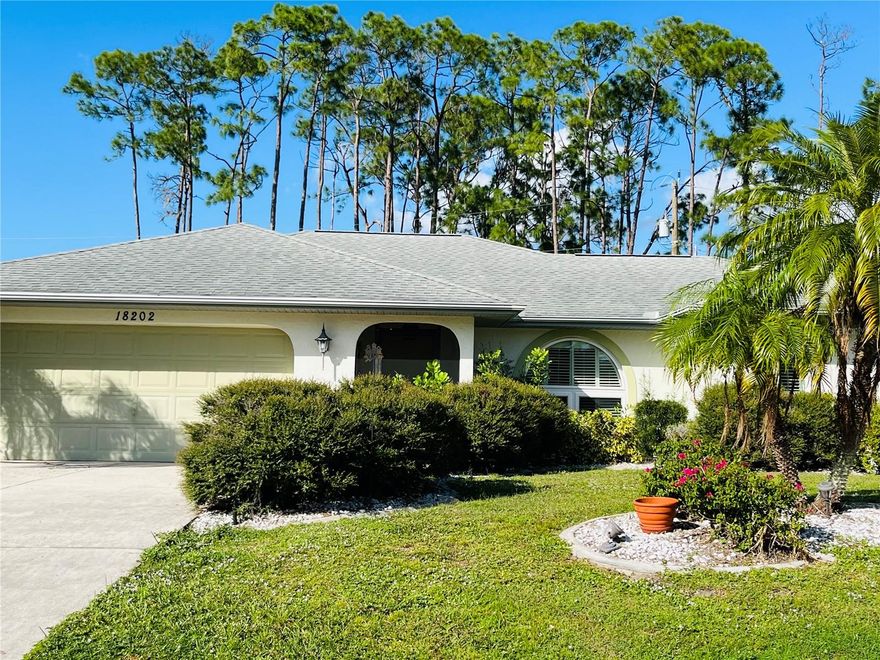 Perfect Port Charlotte location!  This turn key home is fully furnished and ready for you to move right in.  Walk into the living area with high vaulted ceilings with an open and airy feel.  Lots of windows with plantation shutters throughout make this home light and bright. The spacious kitchen opens up to the dining area where you will enjoy peaceful views.  A two bedroom split floor plan features an en-suite bath and walk in closets in each.  There is a third full size bathroom located right beside the sparkling pool.  Pocket sliding glass doors offer indoor/outdoor living.  The pool cage screen has recently been replaced so no bugs to bother you.  The oversized lanai has plenty of room for entertaining and a separate patio for grilling.  Roll Safe electronic hurricane shutters offer peace of mind.  Close to shopping, dining, entertainment, Punta Gorda, Tampa Bay Rays & Atlanta Braves spring training fields and beautiful Florida beaches.