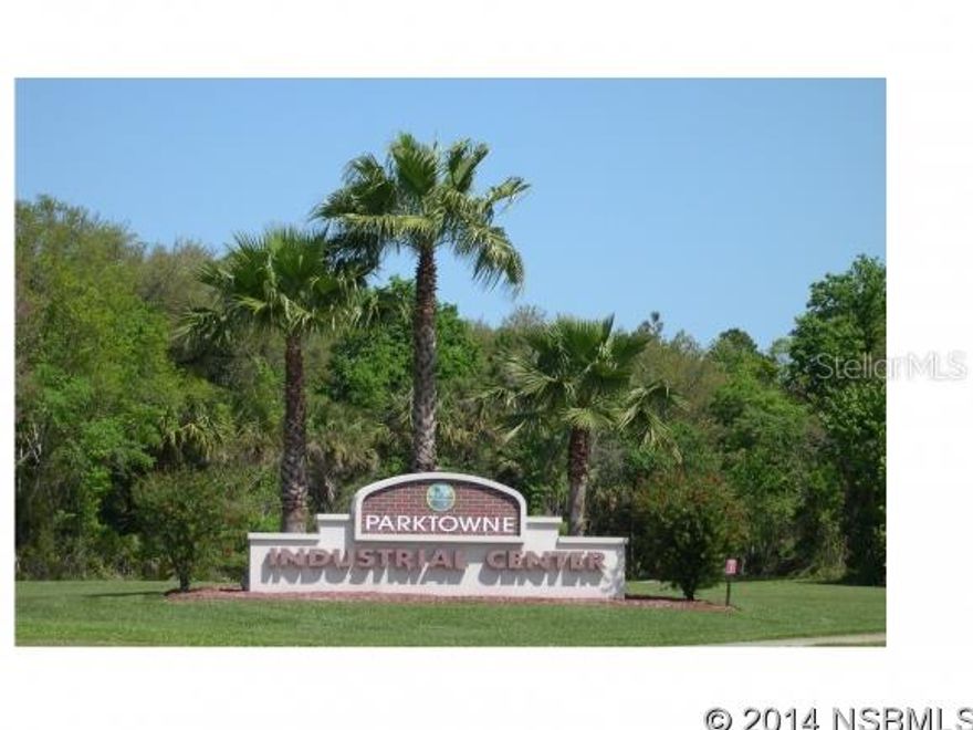 70 Acres of vacant land in Parktowne Industrial Center.  Can be subdivided.  Parktowne has a Development Agreement with the City of Edgewater.  The East side of the property lies in Area "A" which is restrictive and is intended to have outdoor storage as an ancillary use.  The West side of the property lies in Area "B" and is less restricitive and outdoor storage is authorized.  Permitted uses include industiral, manufacturing, warehousing, offices accessory retail and commercial uses.  A copy of the Developement Agreement, C& R's are available upon request.; Cleared: No ;Water: Available at Site