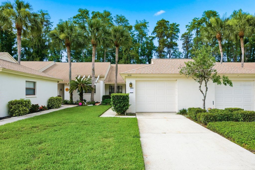 Photo of 9218 Championship Lane, New Port Richey, FL 34655 (MLS # W7886549)