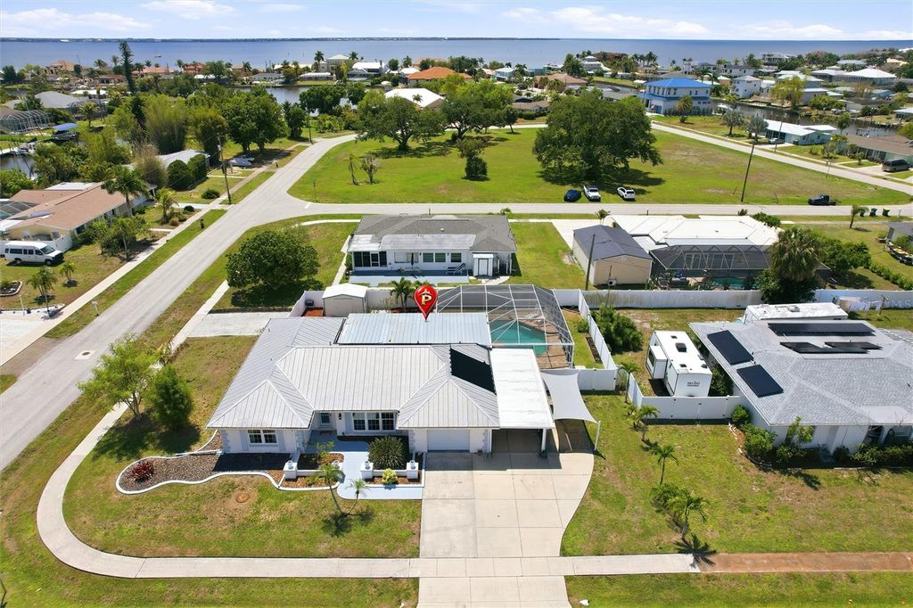 Photo of 361 Wherley Avenue SE, Port Charlotte, FL 33952 (MLS # C7524275)