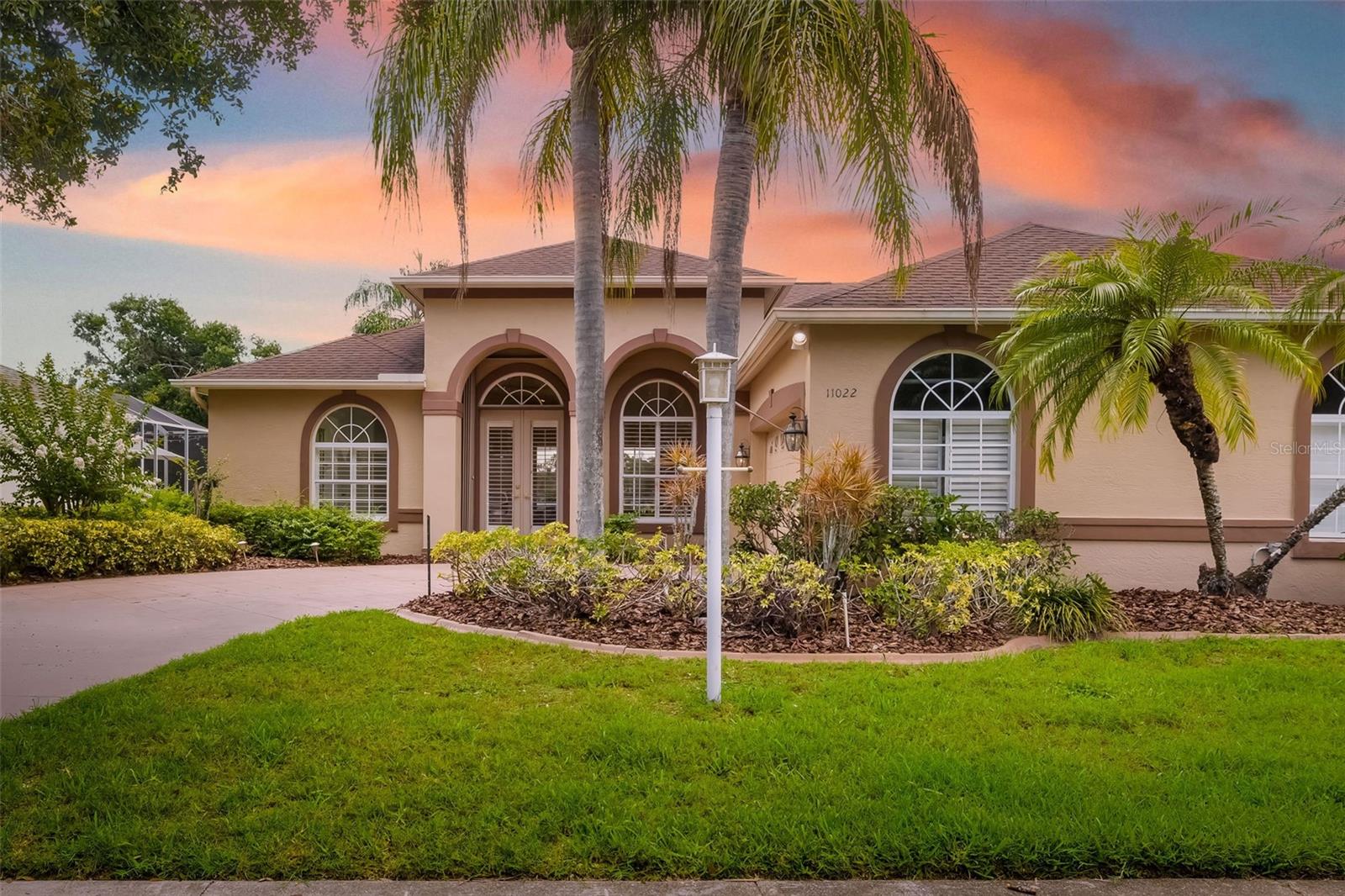Welcome to this impeccably updated 4-bedroom, 3 bathroom residence, ideally situated on a spacious 0.22-acre lot in the highly sought-after Summerfield Park community of Lakewood Ranch, Florida. Boasting 2494 square feet of thoughtfully redesigned living space, this move-in-ready home offers exceptional comfort, style, and functionality.
Step inside the double etched glass front doors to discover brand-new flooring, paint throughout and a fully renovated chef’s kitchen complete with stainless steel gas appliances, sleek quartz countertops, and contemporary cabinetry—perfect for both everyday living and entertaining. The open-concept layout is filled with natural light from oversized windows, creating a bright and welcoming atmosphere throughout.
The primary suite offers a private retreat with a spa-inspired en-suite bath, featuring dual vanities, a tiled walk-in shower, and a relaxing soaking tub and dual closets. Secondary bedrooms are generously sized, ideal for family, guests, or a home office.
Glass sliders open to a fully screened lanai with a sparkling heated pool/spa overlooking tranquil lake views—an ideal setting for outdoor entertaining or enjoying peaceful Florida evenings. Side entry garage and extra long driveway undergoing current renovation that will be completed prior to closing. Residents of Summerfield Village enjoy access to community amenities including a park, playground, tennis courts, basketball courts, and scenic walking paths. Don’t miss this opportunity to secure an update property in one of Lakewood Ranch’s premier and reasonably priced neighborhoods with a super low HOA fee! Lakewood Ranch offers A-rated schools, medical facilities, world class shopping at UTC mall, tons of dining options, and nature preserves, this home offers the perfect blend of luxury and lifestyle. Additionally, convenient access to Sarasota, St. Petersburg, Bradenton, and Tampa, making for an easy commute to each city. Residents are just a short drive from world-renowned, award-winning Gulf Coast beaches, as well as premier golf courses, tennis and pickleball facilities, and a wide range of outdoor recreational opportunities including fishing and boating.