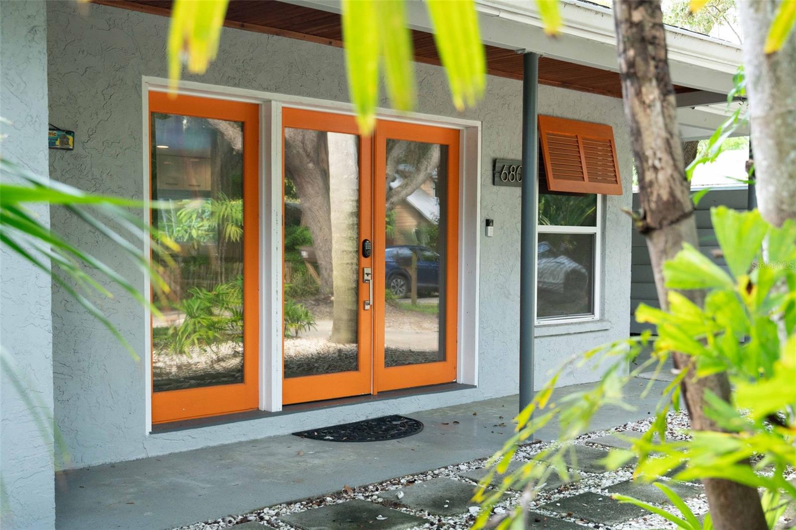 Discover a vibrant and inviting retreat in the heart of Sarasota, just 500 feet from the sparkling waters of Sarasota Bay. Perfectly positioned near the iconic Ringling Museum and the Historic Asolo Theater, this turnkey furnished home places you moments away from the city’s most treasured cultural experiences. Step into your own private oasis, where a resort-style backyard awaits with a heated saltwater pool, fully equipped outdoor kitchen with a TV, and a pergola that offers the perfect shaded escape. Inside, the open and sunlit great room creates a warm, welcoming atmosphere ideal for relaxation. The thoughtfully designed kitchen features sleek modern countertops and elegant contemporary cabinetry, blending style and function for effortless cooking and entertaining. Whether you're enjoying a quiet evening poolside or exploring the vibrant Sarasota scene, 680 41st Street offers a daily escape that feels like a vacation. This stunning home is your chance to embrace the best of Florida living.