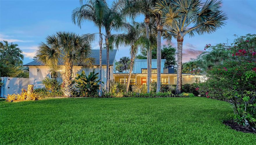 Mid-Century Soul + Coastal Sophistication + West of the Trail. Welcome to a masterfully curated Mid-Century Modern retreat located just north of the Stickney Point Bridge in one of Sarasota's coveted zip codes. Situated on a lush 0.31-acre corner lot, this property offers a rare sense of tranquility and total privacy with no HOA or deed restrictions—all just minutes from the world-renowned quartz sands of Siesta Key or Sarasota’s vibrant Downtown. The Aesthetic: Architectural Artistry. This isn’t just a home; it’s a design statement. Every inch celebrates the iconic MCM silhouette, from the striking floor-to-ceiling stone fireplace to the authentic exposed beams and dramatic vaulted ceilings. The timeless architecture is elevated by contemporary finishes, including large-format porcelain tile, Hunter Douglas window treatments, and custom stained-glass transoms that bathe the space in natural light. The Vibe: Indoor-Outdoor Synergy. Live the Sarasota dream in a space designed for the ultimate entertainer. The family room features pocketing glass sliders that reveal your private outdoor oasis, seamlessly dissolving the line between indoors and out. Host “golden hour” gatherings on the 20’ x 14’ composite deck, dine alfresco beneath the Cypress-wood lanai, or unwind in the heated saltwater pool—all enveloped by lush, professionally designed tropical landscaping and a fully fenced yard. Inside the lanai, a tranquil pond with a pump and cascading waterfall creates the perfect setting for meditation. The private, gated west-side yard—just off the primary bedroom deck—offers an additional secluded retreat, while thoughtfully designed landscape lighting sets the stage for stunning evening vistas. Retreat & Versatility: The Primary suite is a true sanctuary, boasting a sun-drenched reading nook, a spacious walk-in closet, and private deck access perfect for your morning coffee. On the opposite wing, a secondary primary-style suite offers ultimate flexibility for high-end guest hosting or a sophisticated home office. Another spacious guest bedroom completes the floorplan. With three full baths and a thoughtful "split" floor plan, the layout is as functional as it is beautiful. Modern “Peace of Mind Checklist” features include: new roof (2024), new ductwork (2024), fresh exterior paint (2024), 3 new water heaters (2024/2023), impact rated windows & doors (2023/2020), high-efficiency A/C (2020), Honeywell Home WiFi thermostat, and updated ADT monitored security system. Parking Pro: Two separate driveways plus a one-car garage for all your toys.