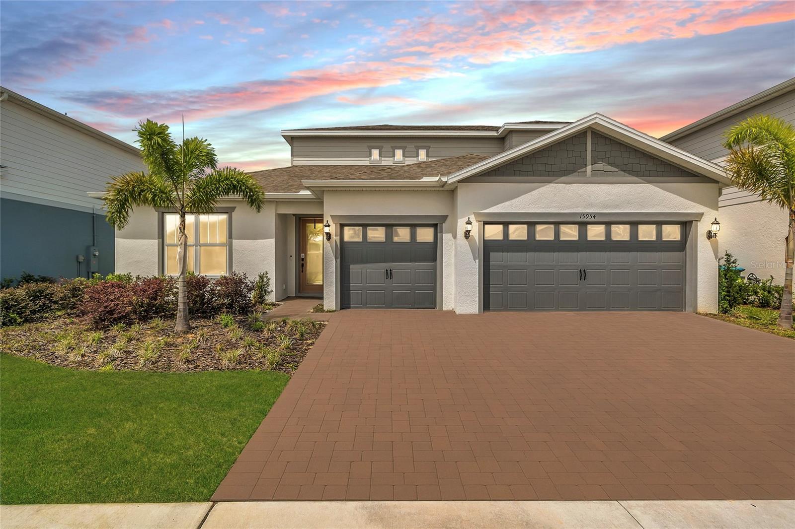 Why wait for a new home to be built? This NEWLY BUILT home is READY NOW and offers the perfect blend of MODERN DESIGN, FUNCTIONALITY, and FLEXIBILITY—all in the scenic, GATED community of Willow Ridge in Montverde.
With 4 BEDROOMS, 3.5 BATHS, a DEDICATED OFFICE, BONUS ROOM, and NO REAR NEIGHBORS, this popular ASHBY GRAND floor plan lives large and adapts easily to your lifestyle. Enjoy a SPLIT FLOOR PLAN with the OWNER’S SUITE on one side and TWO BEDROOMS with a shared bath on the other—ideal for PRIVACY and DAILY COMFORT.
The MAIN LIVING SPACE is all on the FIRST FLOOR, giving you the ease of SINGLE-STORY LIVING, while upstairs offers a BONUS ROOM, FULL BATH, and FOURTH BEDROOM—perfect for GUESTS, TEENS, or creating SEPARATE SPACES for play, work, or relaxation.
This NATURAL GAS home features WOOD-LOOK TILE in the main areas, a SPACIOUS MODERN KITCHEN, a SCREENED-IN PAVERED LANAI with a RETRACTABLE SCREEN, and a PAVERED DRIVEWAY for added curb appeal.
Located LESS THAN 5 MINUTES from MONTVERDE ACADEMY, Willow Ridge offers a LOW HOA that includes a COMMUNITY POOL, CABANA, GATED ENTRY, plus HIGH SPEED INTERNET and STREAMING TV—all with NO CDD FEES. You’ll also be just minutes from the future growth in Minneola, including PUBLIX, CROOKED CAN at Hill City Center, and ADVENT HEALTH’s upcoming hospital campus.
Skip the build time—move into a better lifestyle now.