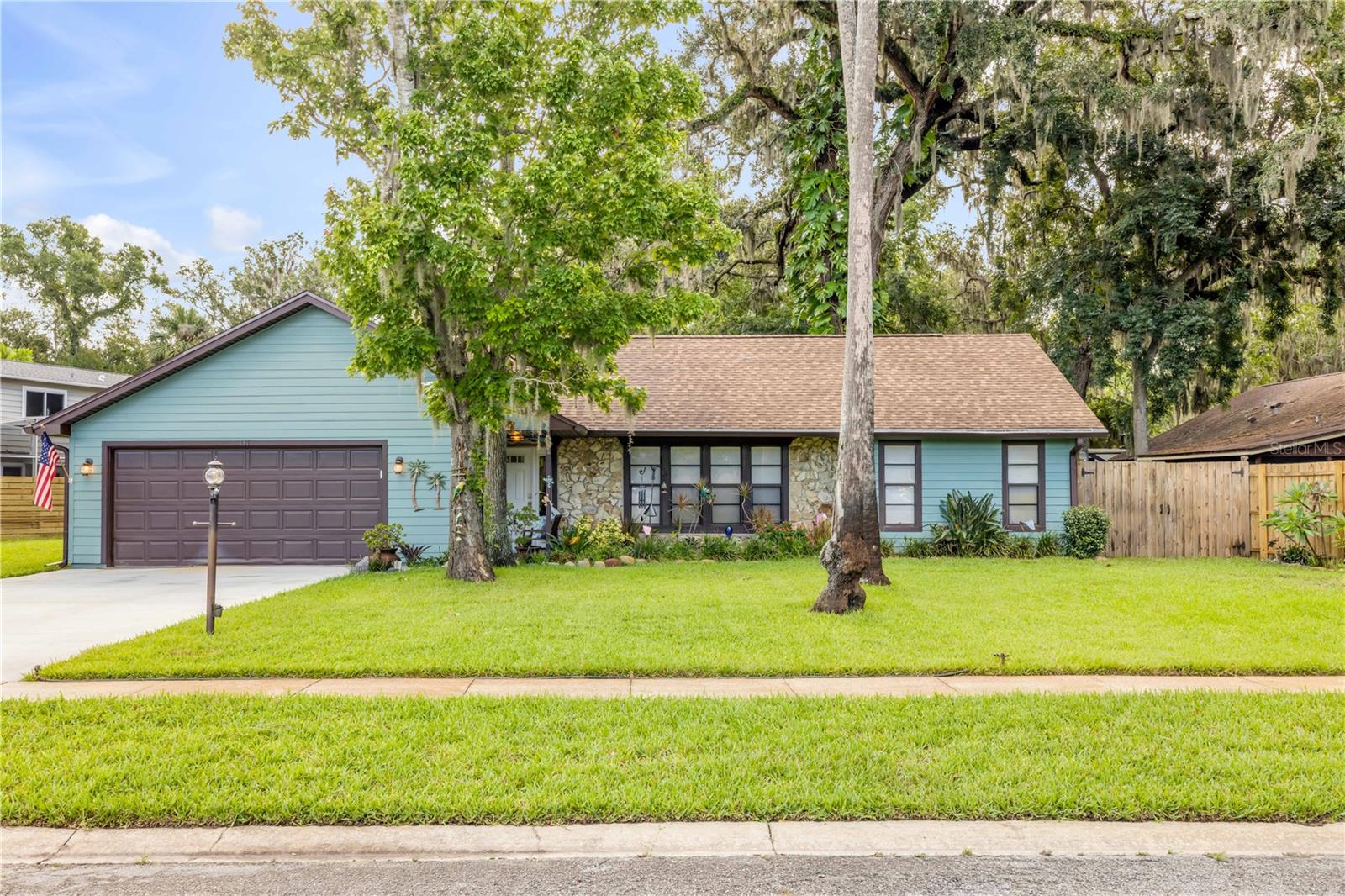 Welcome to this beautifully upgraded residence located in one of Port Orange’s most sought-after neighborhoods, zoned for top-rated schools and just a short walk to All Children’s Park and the Dog Park. This meticulously maintained home offers all of the modern updates of a new build with the character, craftsmanship and pride of ownership the newer homes just can’t offer.
The brand new roof sets the tone for the quality you’ll find throughout. The exterior also features upgraded Hardie Board plank siding, a fiberglass impact-rated front door, and hurricane-impact windows for added peace of mind.
Inside, the home boasts elegant finishes including tile flooring throughout, authentic 2 coat lath-and-plaster walls, and solid yellow pine interior doors. The inviting living area is anchored by a Florida Stone wood-burning fireplace, offering warmth and character. The chef’s kitchen is a standout, equipped with 8-foot tall maple cabinetry, quartz countertops, and top-of-the-line appliances — including a convection/air-fry range, Delta fixtures, a push-button disposal, and an Insta-tap hot water. The thoughtful layout includes an open concept living area, ideal for entertaining, and a split-bedroom floor plan for added privacy.
The primary suite is a private retreat, featuring a luxurious soaking tub, a custom walk-in closet with built-in organizers, and a dedicated shoe closet. The en-suite bath showcases a floor-to-ceiling tiled shower, a bamboo panel, and teak wood accents, creating a spa-like experience. Each bedroom is generously sized, comfortably accommodating king-sized beds. Bonus room in the front of the home is perfect for a den, home office or a 4th bedroom. The lot is uniquely positioned between two city-designated parks, giving you access to over 1.5 acres of green space — all without the burden of maintenance or added taxes. There is an easy access covered area for boat/RV parking and a separate 50 amp service for power. Tankless HW heater and much more.
This home combines modern luxury, energy efficiency, and thoughtful design, all in a prime Port Orange location with no HOA restrictions. Properties of this caliber rarely come to market — schedule your private showing today and start “Living the Dream” in Port Orange today…..
All information is intended to be accurate but is not guaranteed.