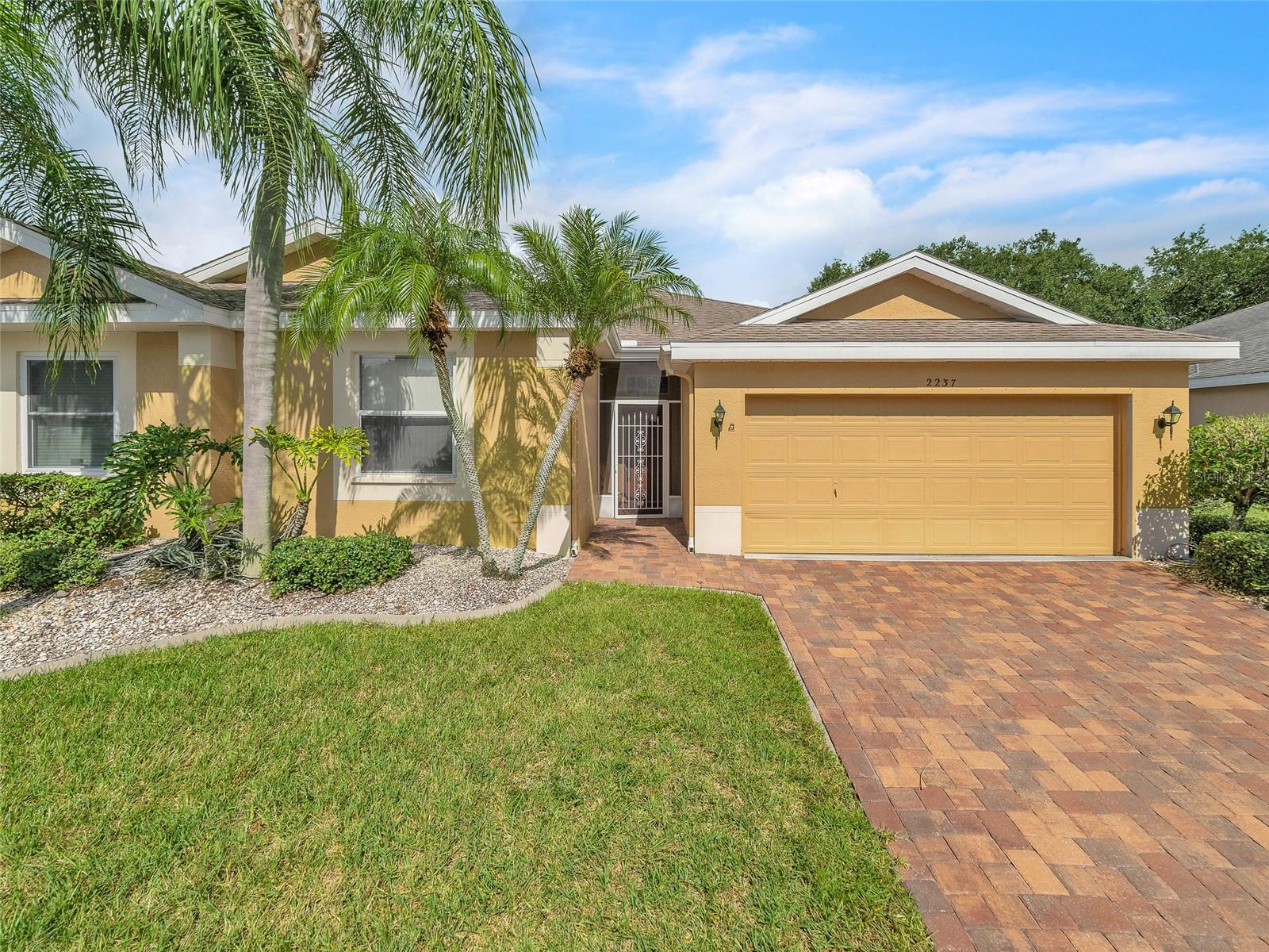 One or more photo(s) has been virtually staged. 55 plus Retirement Community in Sun City Florida. This maintenance-free living condo has everything to offer a new buyer. Just bring your toothbrush and start living the dream in fabulous Kings Point. Located in Manchester III neighborhood of Kings Point. This fabulous Malibu floor plan features 2 bedrooms, 2 bathrooms plus a flex room that is perfect for a den/office or even a sewing room. Brick paver driveway, screened entry, transom window over front door. Upon entering the home you will find the second bedroom and bathroom off to the right of the foyer. The secondary bathroom has a tub/shower combo and white cabinet vanity. Wood laminate flooring in main areas and flex room, solar-tubes in great room and master bathroom that bring in an abundance of natural light. At the back of the home, sliding glass doors lead out to the air conditioned Florida room with ceiling fan, ceramic tile flooring and additional sliding glass doors to backyard. The gathering room is in the middle of the home with an open dining room with a plant shelf. The kitchen has white cabinets, nickel hardware, recessed lighting, ceramic tile backsplash with design, closet pantry. Off the breakfast nook is another private Florida room with ceramic tile flooring, ceiling fan and perfect size for a desk. The master bedroom has vaulted ceilings, a en-suite bathroom with white cabinet vanities, lots of closet space, and oversized walk in shower. Condo fees include gated security with 24-hour guard, premium cable, Internet, building insurance, roof, maintenance exterior, maintenance grounds, pest control, recreational facilities, sewer, trash and water, escrow reserves fund, fidelity bond and all of the incredible amenities. Kings Point is a resort-style community with two beautiful clubhouses, an 850-seat Veterans Theater, 6 heated pools, 2 hot tubs, state-of-the-art fitness centers & a full service spa where you can get a massage and hairstyle, or have your nails done. Tennis courts, 3 golf courses in the area, billiards, pickleball courts, and endless recreation opportunities. Dozens of social and sports clubs will keep you entertained year-round. The community even has its own free transportation system, and allows access to doctors, hospitals, shopping, banking and restaurants via golf cart. Centrally located minutes from an assortment of spectacular beaches, world class fishing, Tampa's cruise port and Disney World. Kings Point is a great place to live! Manchester III is also part of the 80/20 rule where an age waiver is possible. Manchester III also allow emotional support and service animals with proper documentation provided to association.